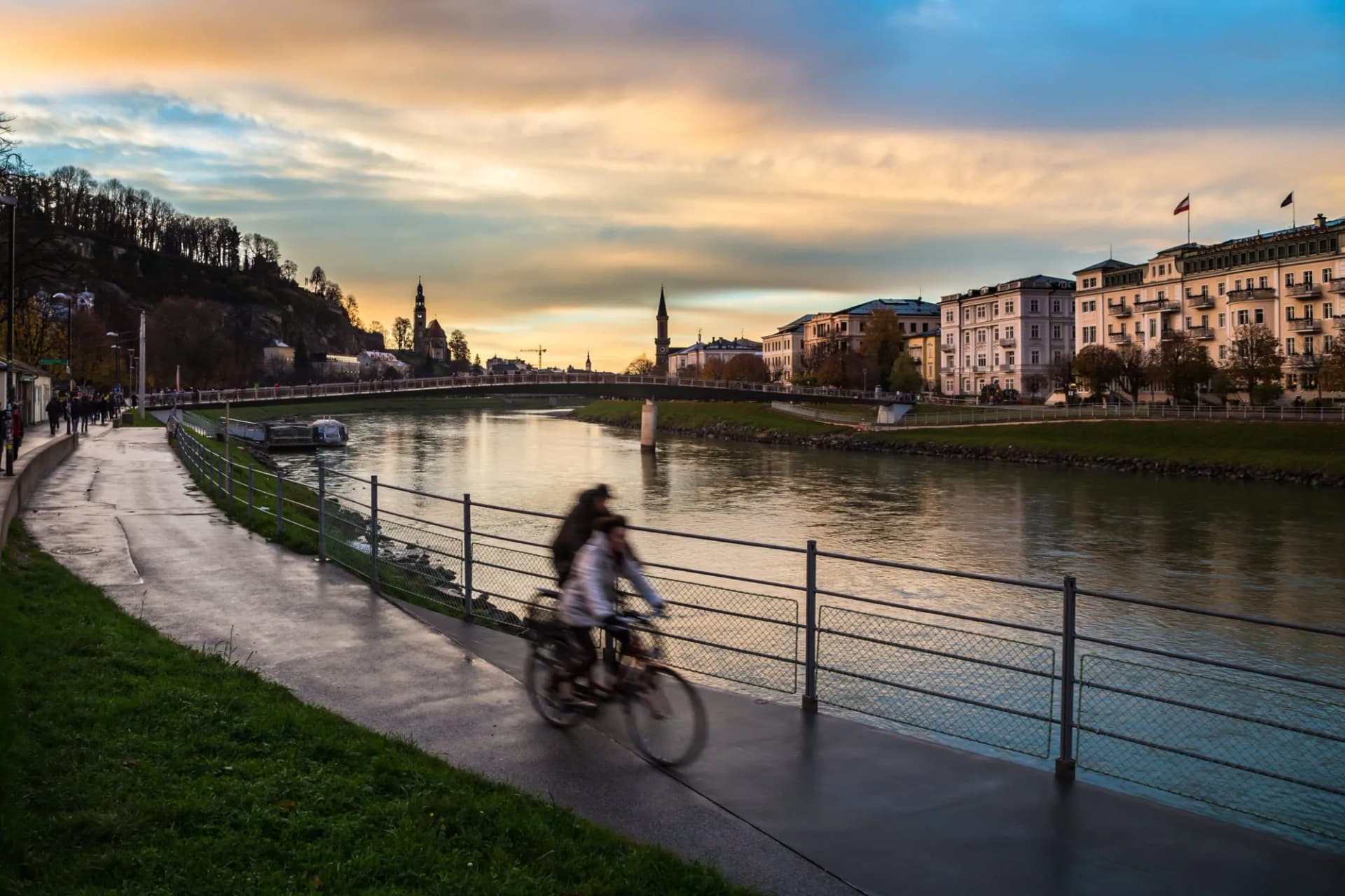 two bikes next to Salzach river of Salzburg
