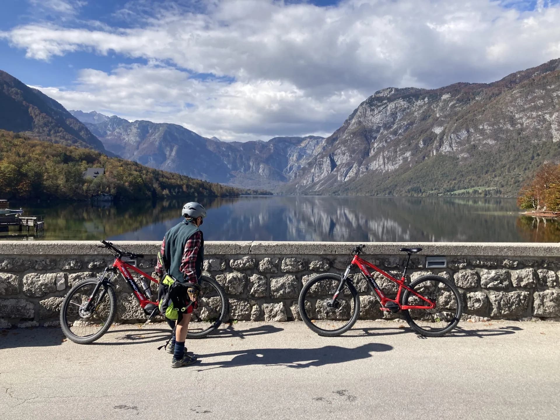 cycling over the bridge at lake bohinj