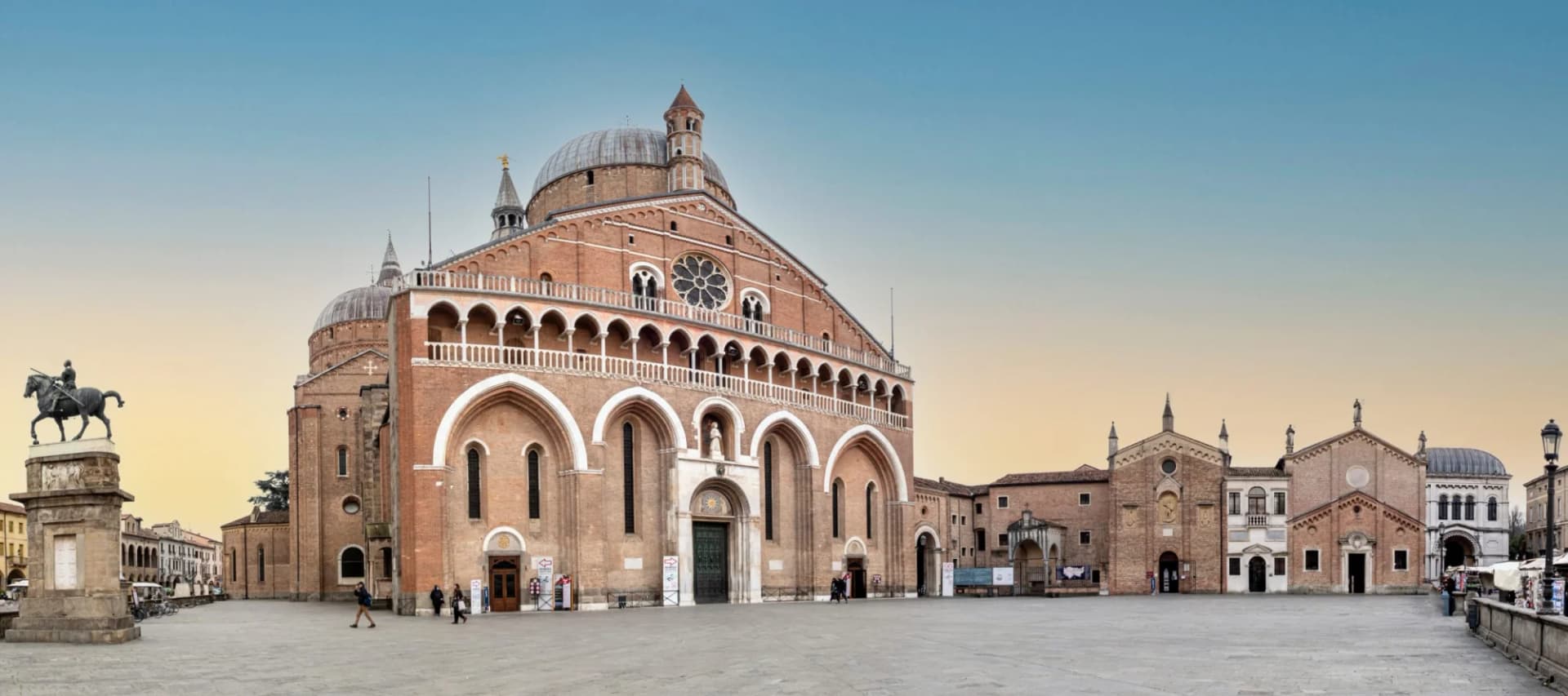Basilica of Saint Anthony and equestrian statue in a large square in Padova.