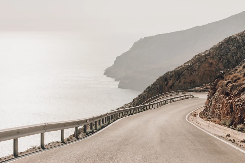 Mountain empty road with sea view on Crete, Greece