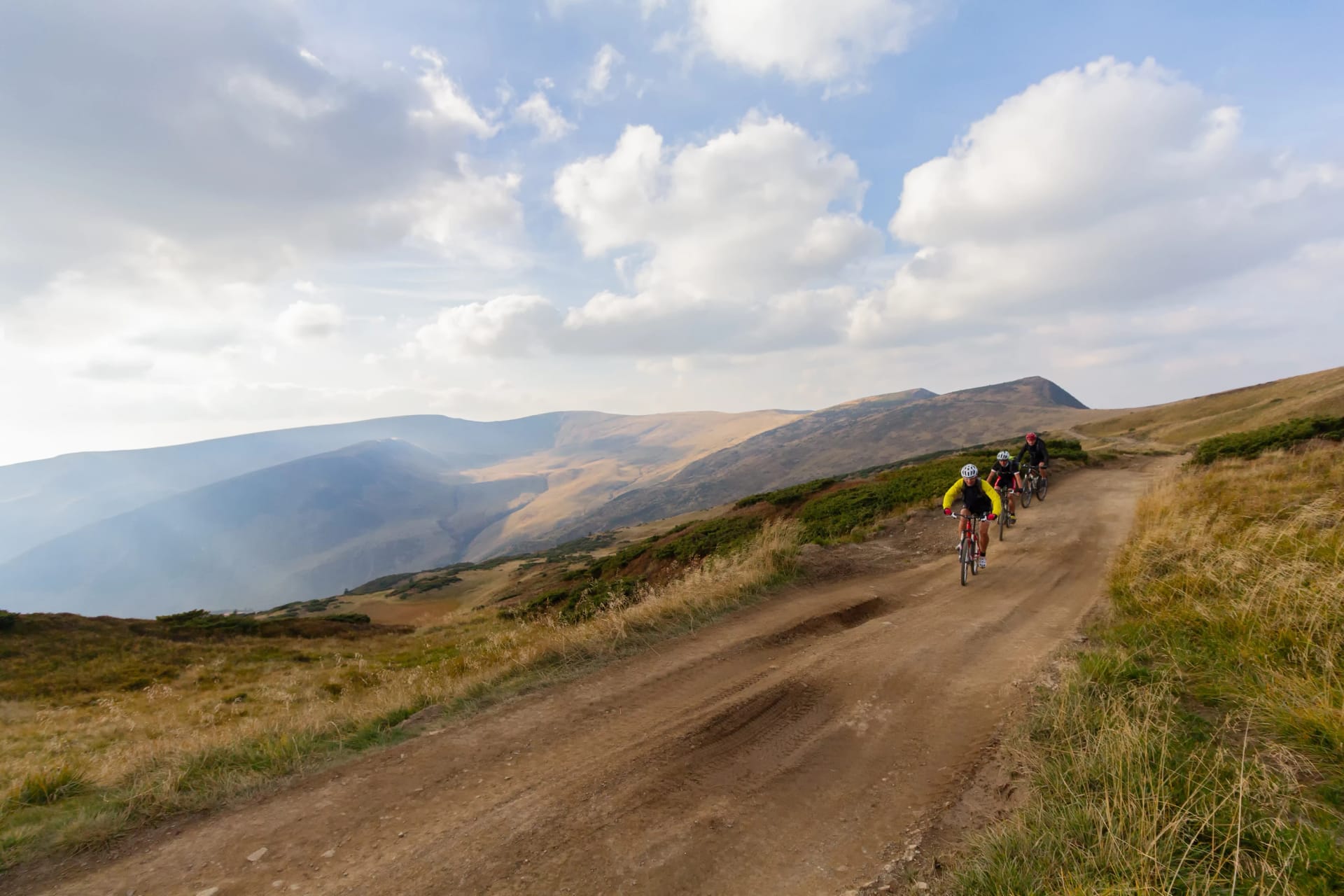 Bikers on road in the Carpathian mountain