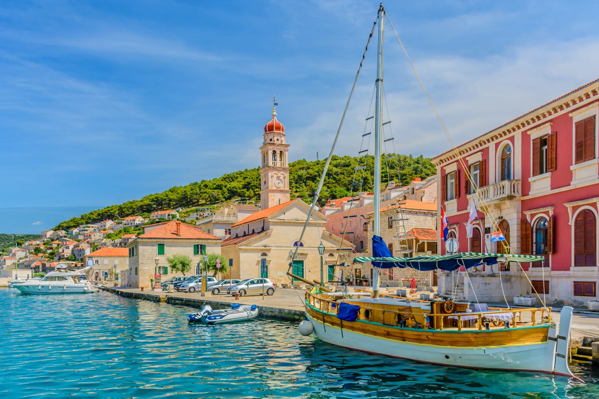 Pucisca town coastline cityscape. / Pucisca is small mediterranean town on Island of Brac, touristic destination in Croatia, Europe.