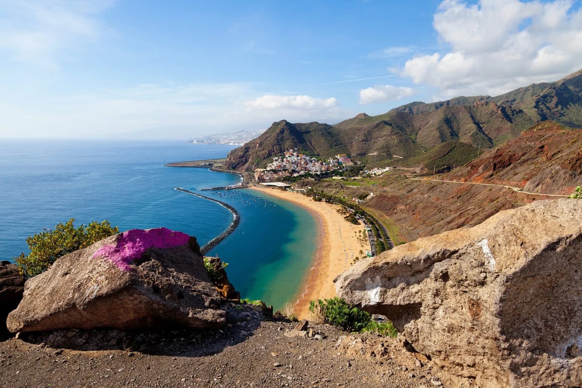 Las Teresitas Beach Tenerife overview from viewpoint with brown mountains and blue sea.