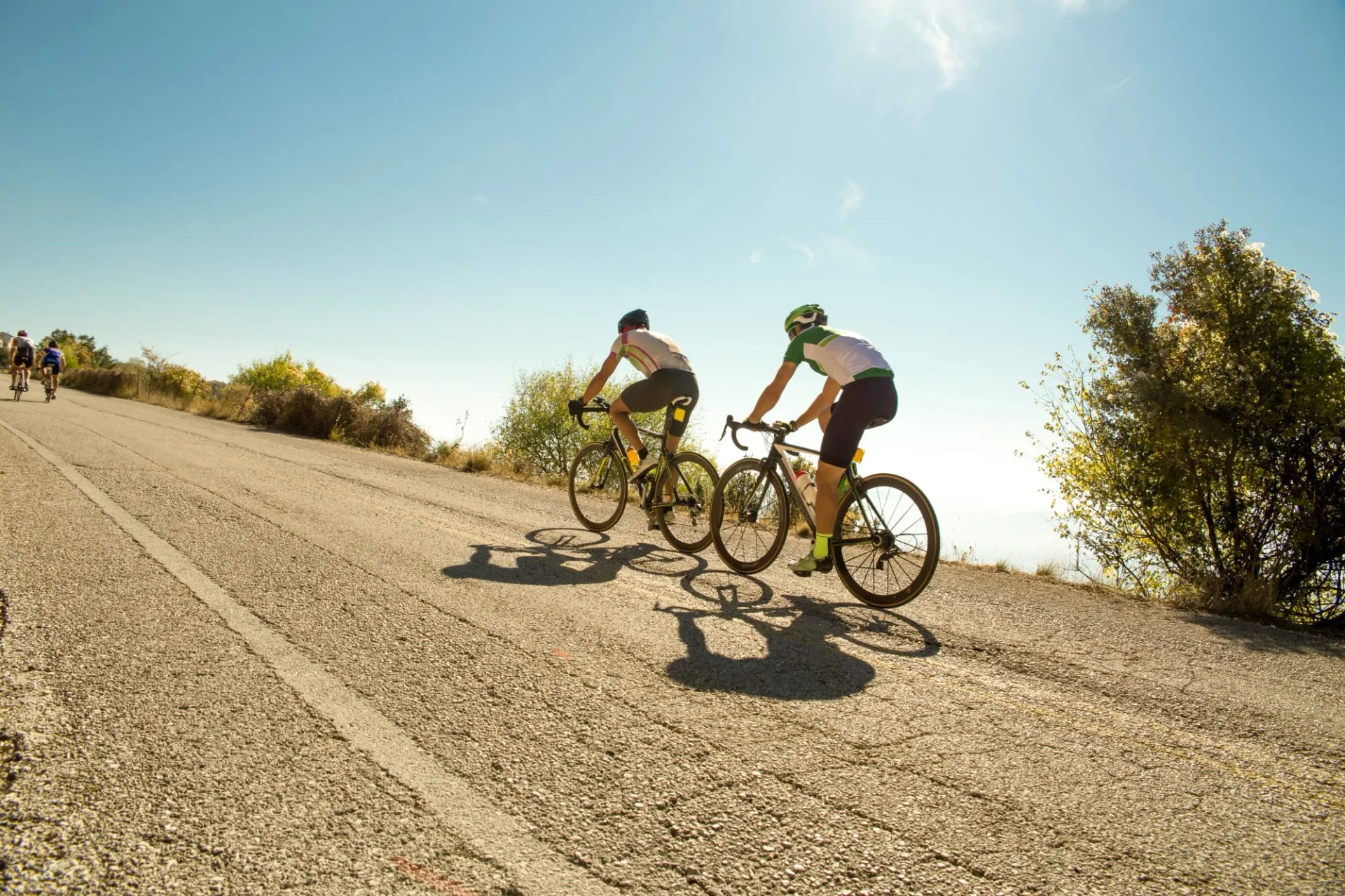 bike race in the morning on uphill road
