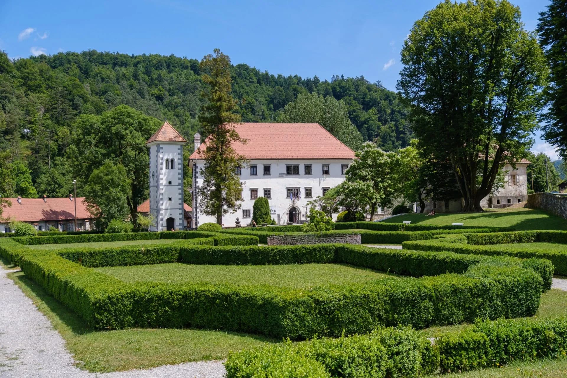 polhov gradec mansion with blooming garden in summer stockpack adobe stock scaled