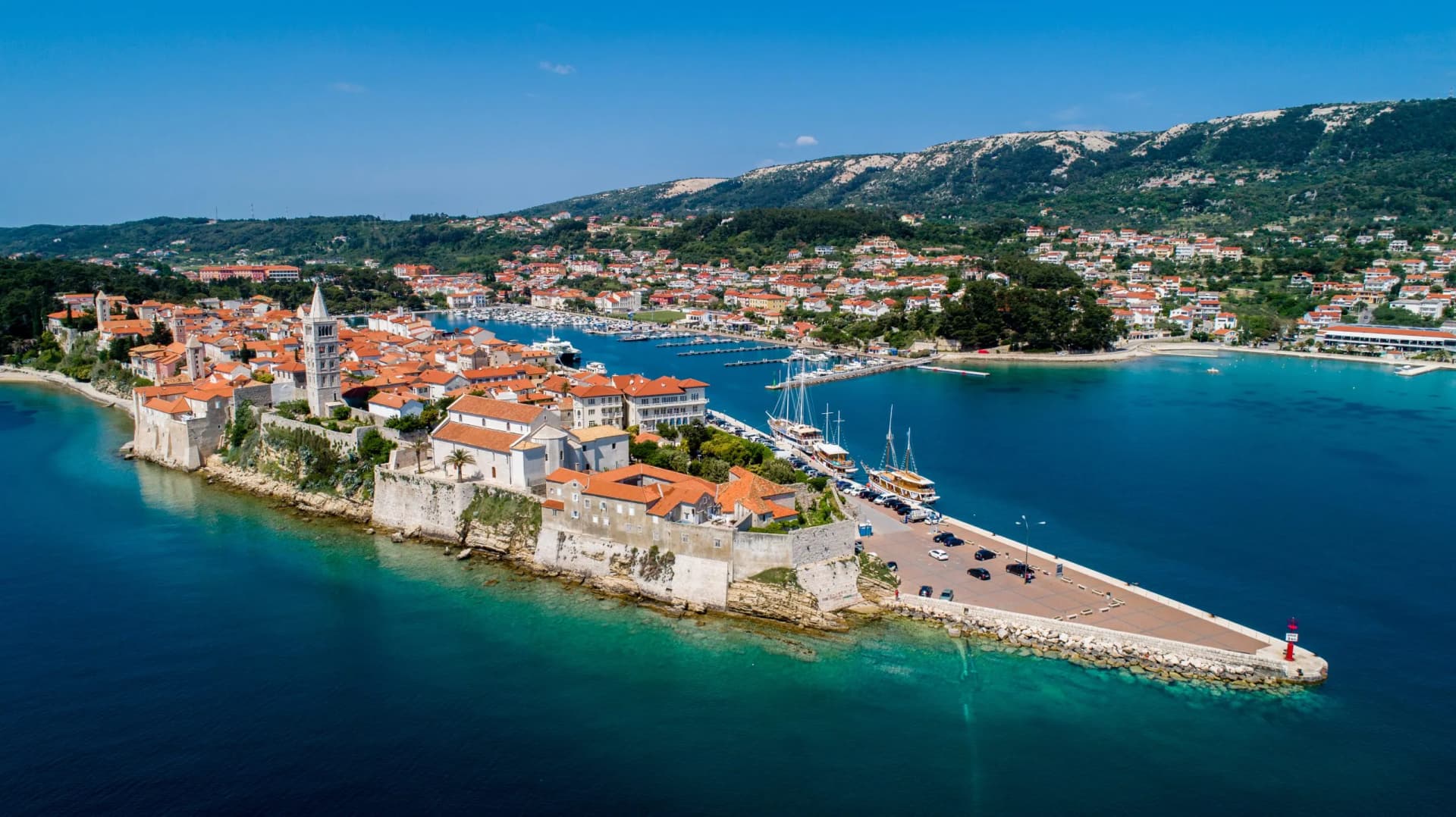 Rab is a Croatian island in the Adriatic Sea, old town encircled by ancient walls. The town’s 4 prominent church bell towers include the Romanesque tower at the Cathedral Svete Marije (St. Mary)