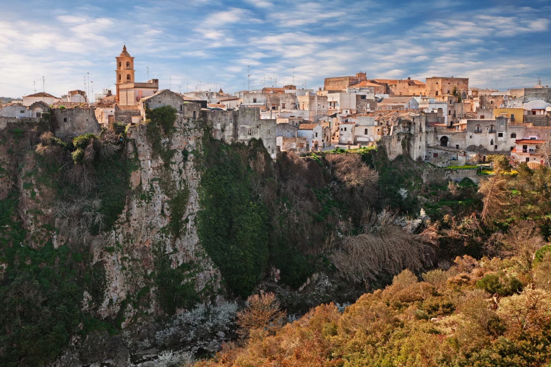 Laterza town perched on canyon edge in Terra delle Gravine nature park, Puglia, Italy.