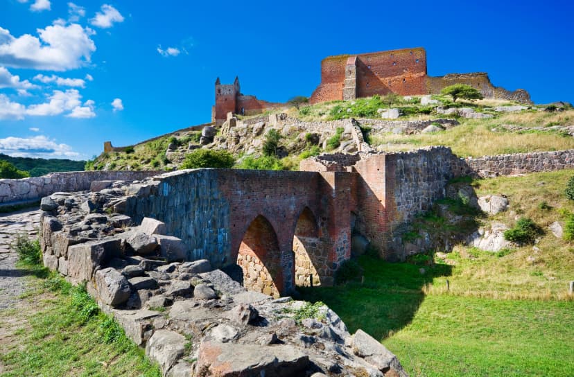 Hammershus castle - the biggest Northern Europe castle ruins situated at steep granite cliff on the Baltic Sea coast, Bornholm, Denmark
