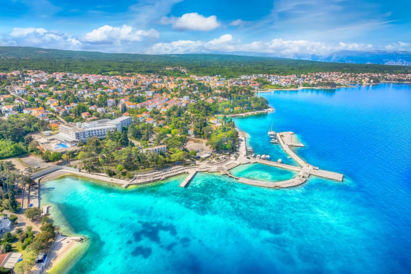 Aerial view with Malinska town and beach, Krk island, Croatia