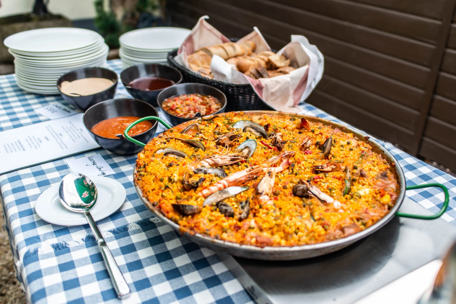 huge Paella pan plate with seafood and rice traditional Spanish food