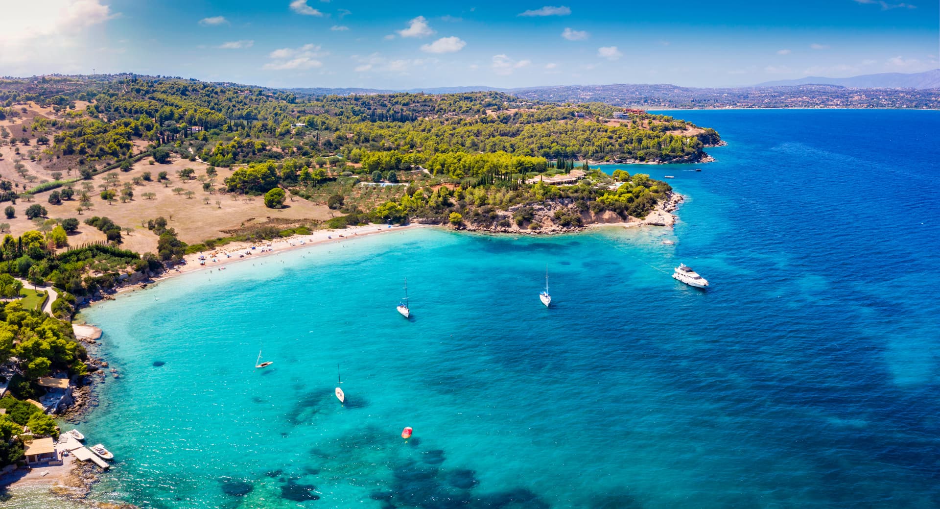 Panoramic aerial view of the beach Koounoupi, close to the cosmopolitan town Porto Heli, Pelponnese, Greece